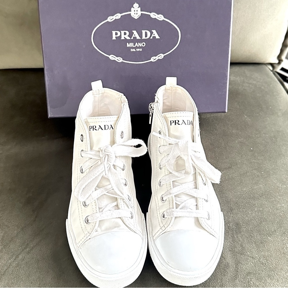 PRADA all white leather high top sneakers size 34 with original box on real real